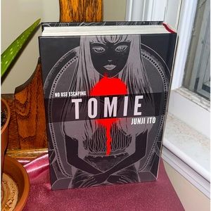 TOMIE hard cover book